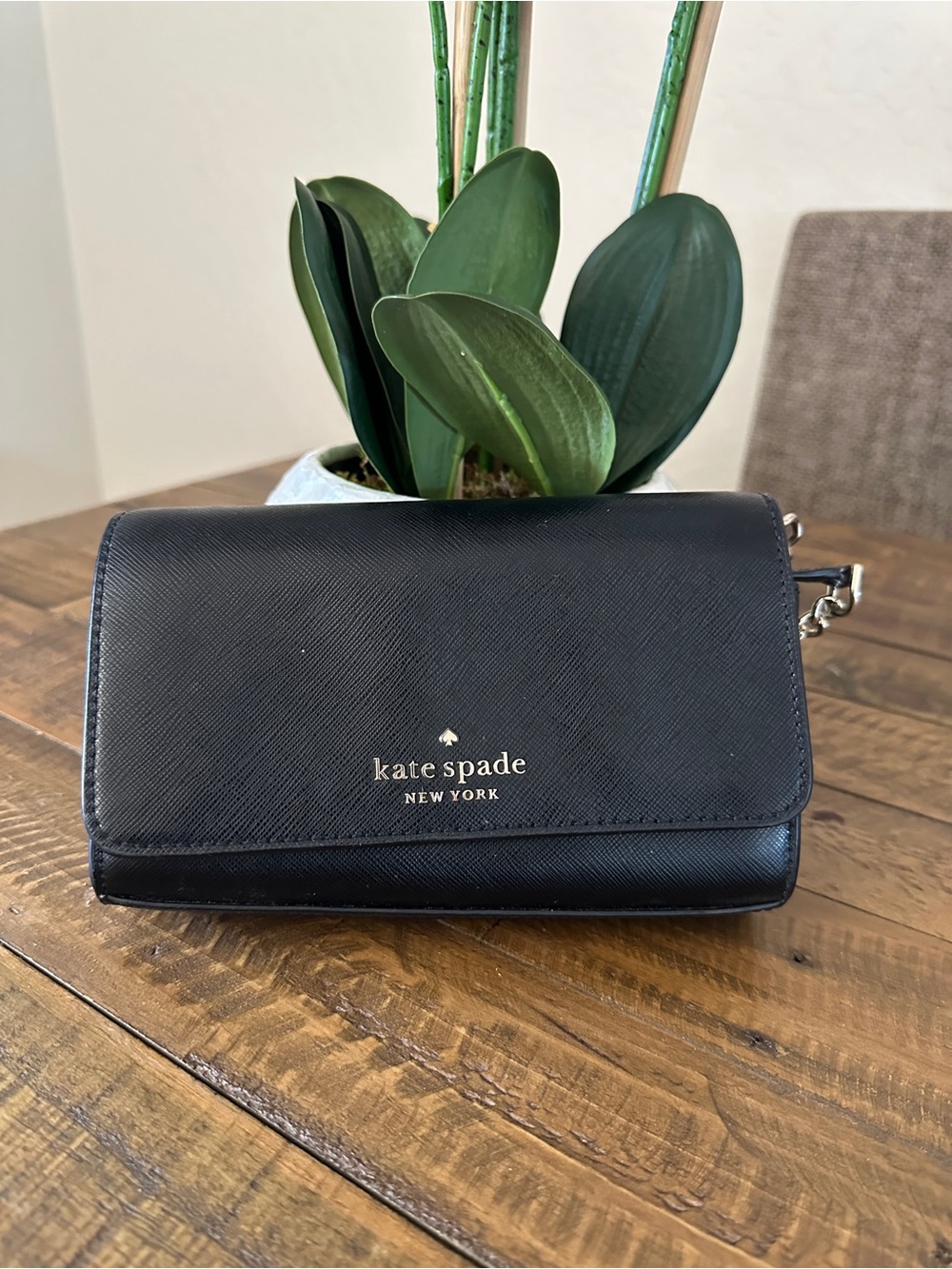 kate spade black saffiano crossbody bag with gold logo